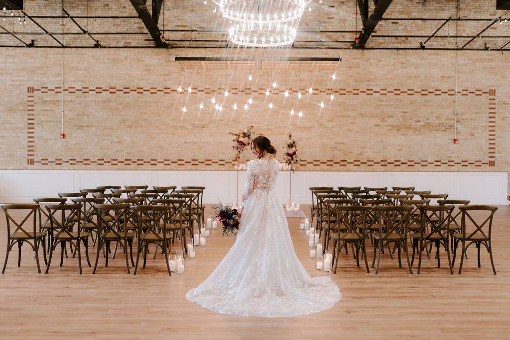 Bride poses in the indoor ceremony space at 10 South.