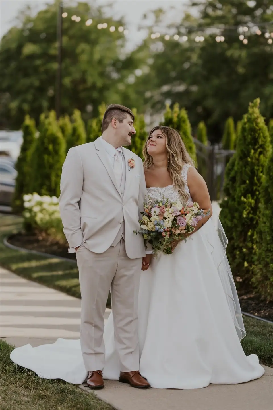 Bride and groom share a quiet moment outdoors at 10 South, a grand wedding venue in Janesville, Wisconsin